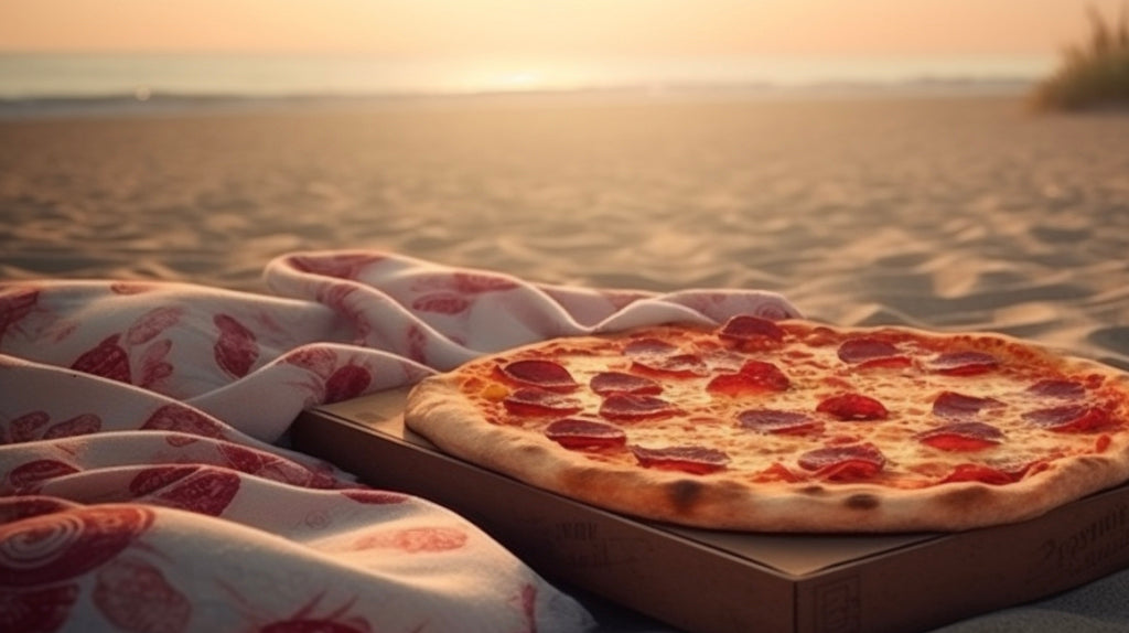 Pizza in a box at the beach