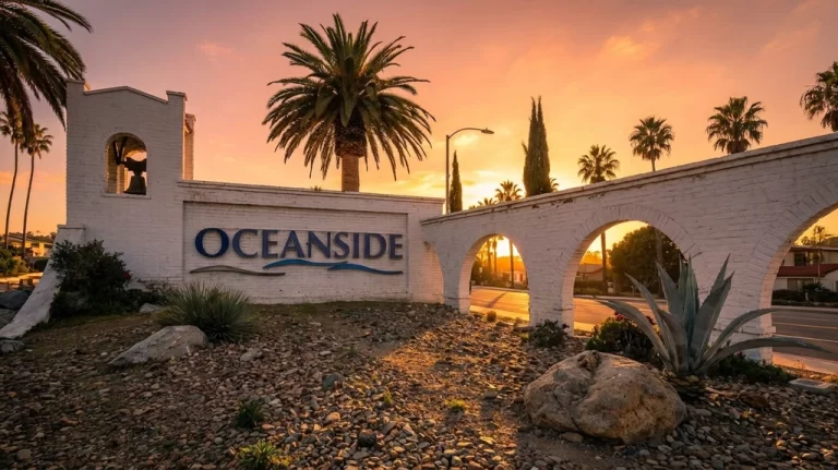 Oceanside Welcoming Arches at golden hour sunset - white Mission-style adobe archway